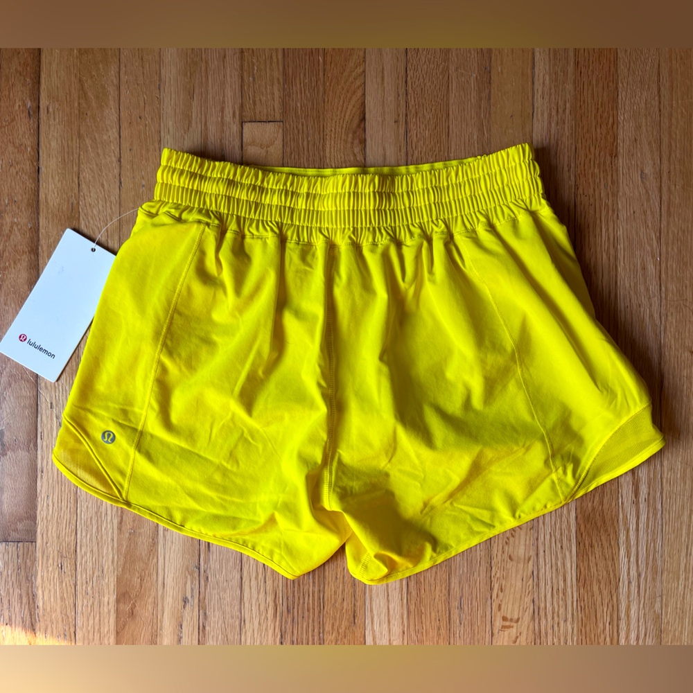 NWT lululemon Hotty Hot HR 4 inch shorts, size 8. Bright yellow.